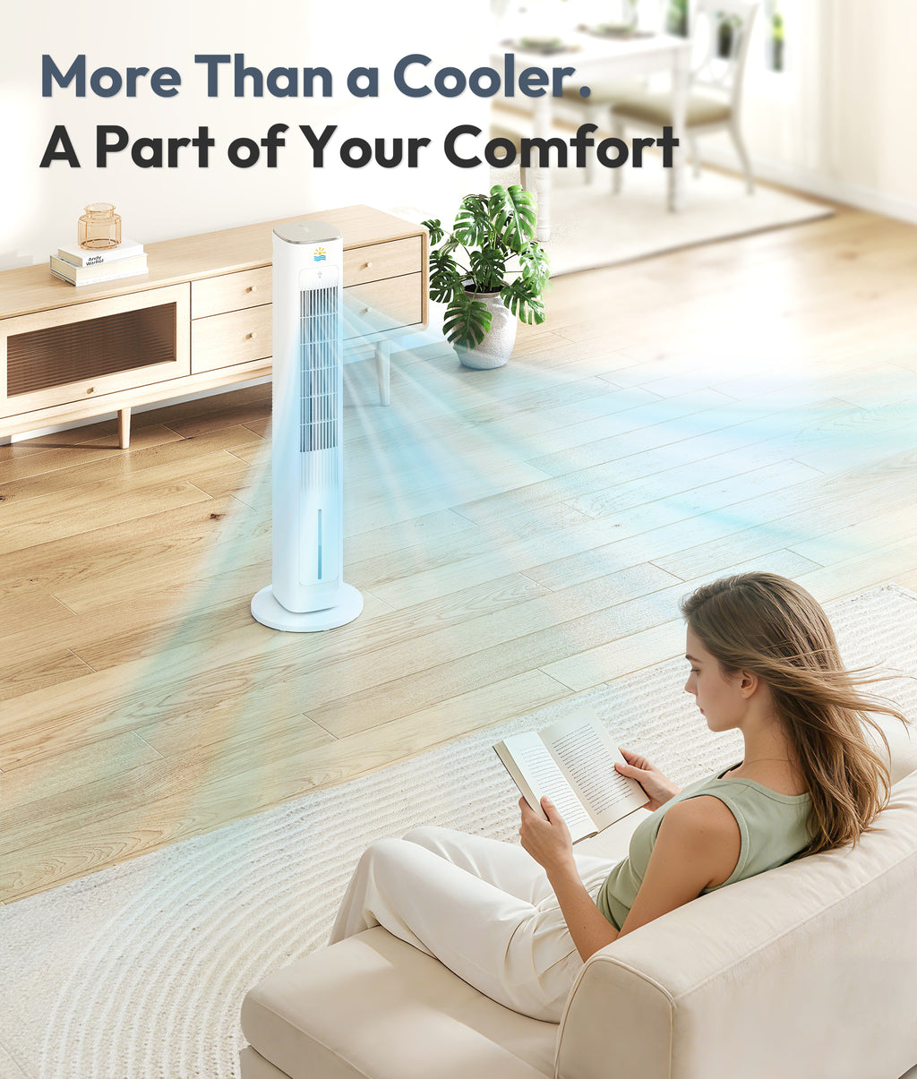 Woman reading a book on a couch with a tower cooler in the background
