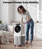 Woman moving a portable air conditioner in a living room with text 'Compact Design. Easy Mobility.'