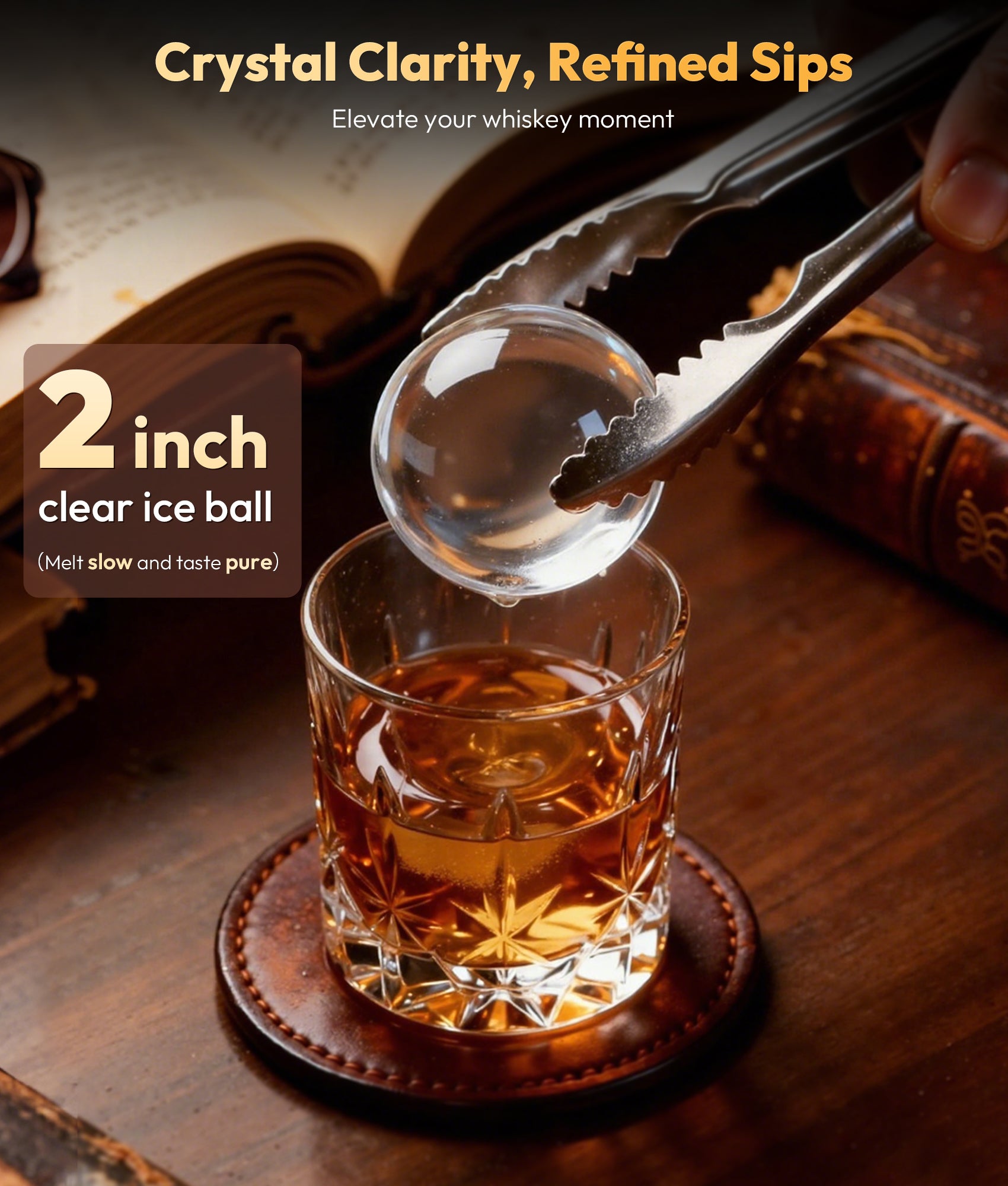 Glass of whiskey with a clear ice ball being added, set against a wooden background.