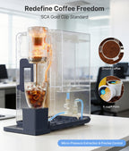 Coffee machine with clear design showing brewing process, surrounded by office furniture.